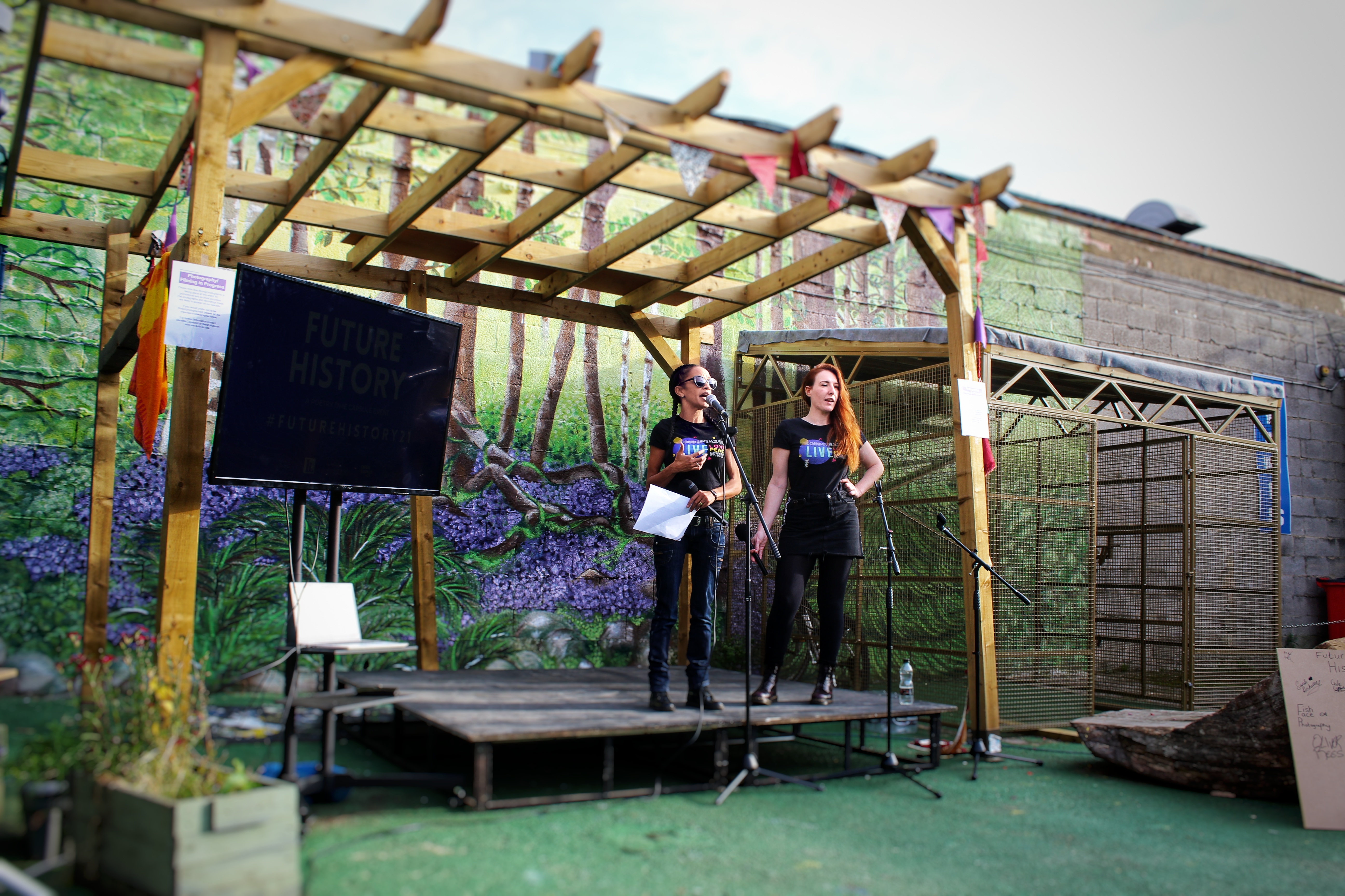 Denetta Copeland and Sarah Autumn speaking to audience at Future History event at Open Source Arts.